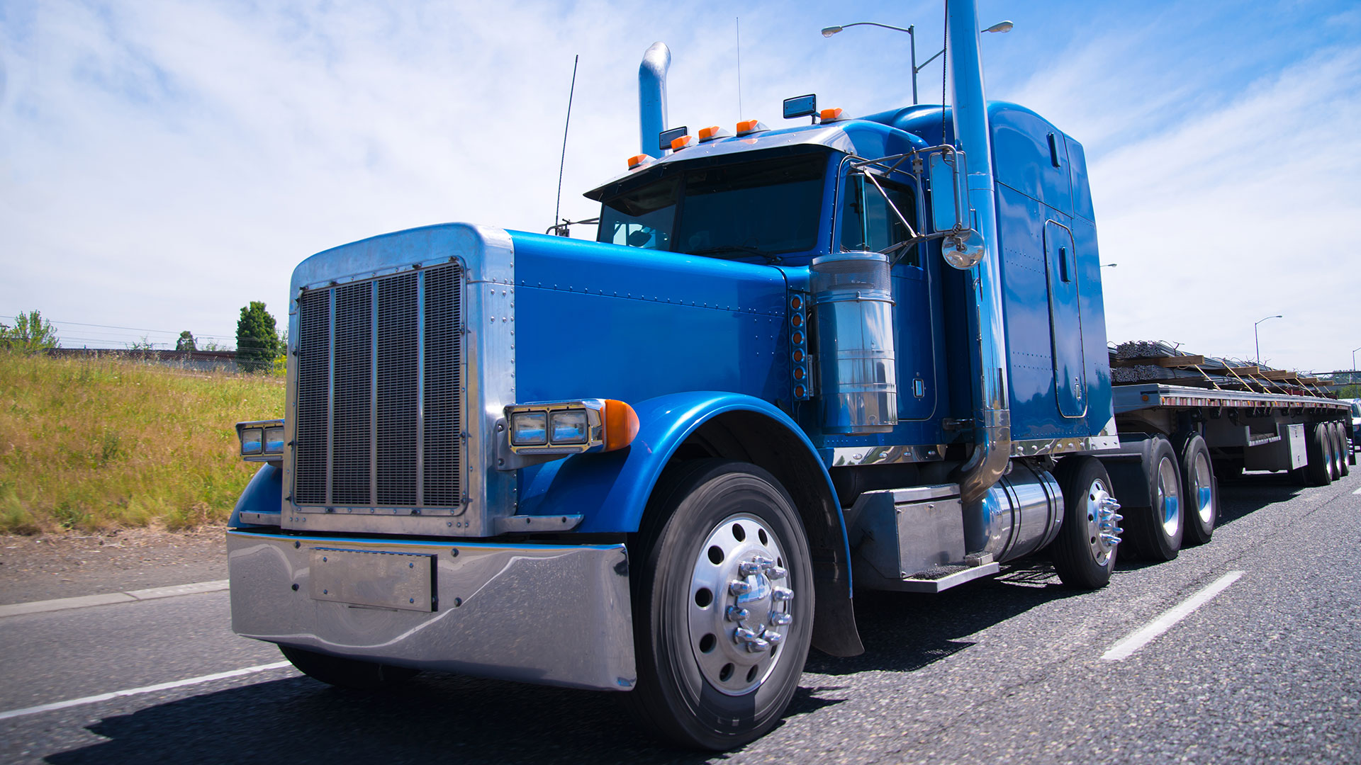 owner-operator-2-side-image Image of ADICA owner operator flatbed truck.