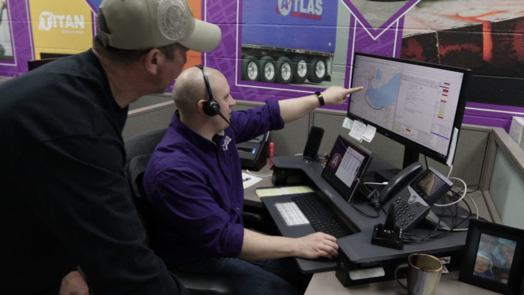 Image of Atlas trucking company providing logistics services.